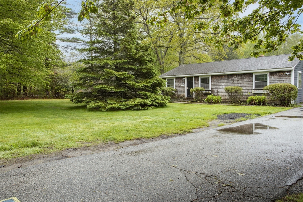 175 Summer Street Norwell, MA 02061 - Photo 2 of 29 a view of a house with a garden