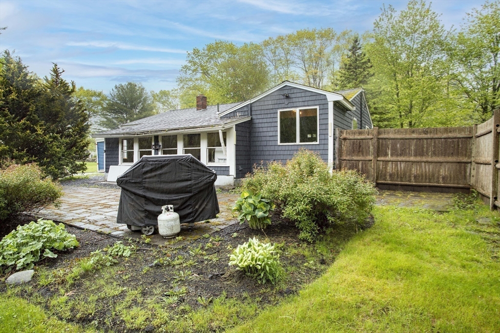 175 Summer Street Norwell, MA 02061 - Photo 23 of 29 a view of a yard in front of a house with a large tree