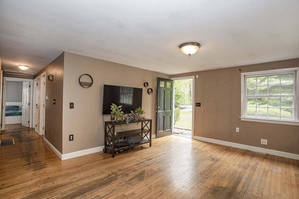 175 Summer Street Norwell, MA 02061 - Photo 4 of 29 a view of a livingroom with wooden floor and furniture