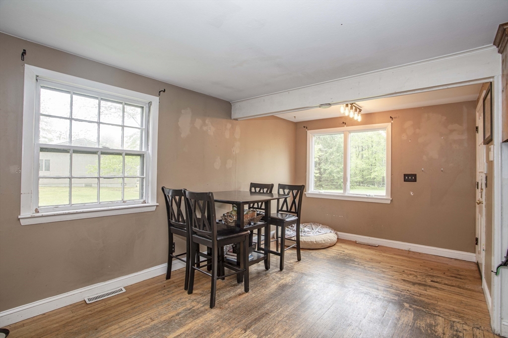 175 Summer Street Norwell, MA 02061 - Photo 9 of 29 a view of a dining room with furniture window and wooden floor