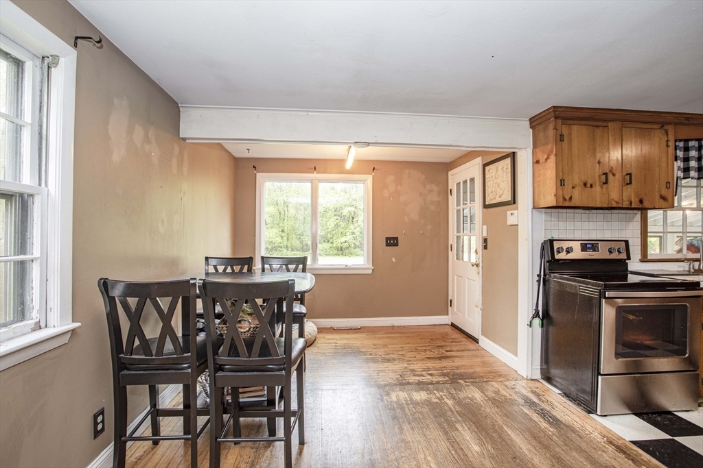 175 Summer Street Norwell, MA 02061 - Photo 10 of 29 a view of a dining room with furniture and a window