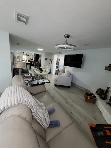 a living room with furniture and window