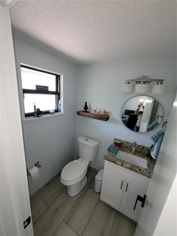 a living room with furniture a window and couch