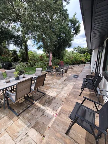 a backyard of a house with lots of green space