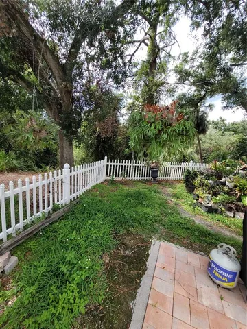 a view of backyard with green space