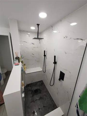 a bathroom with a sink and mirror