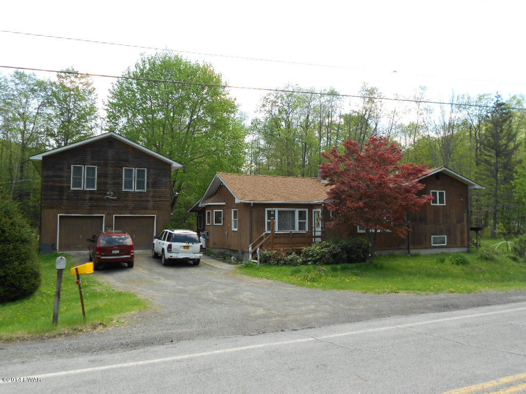 85 Elk Brook Road Road Delhi, NY 13753 - Photo 7 of 11 a car parked in front of a house