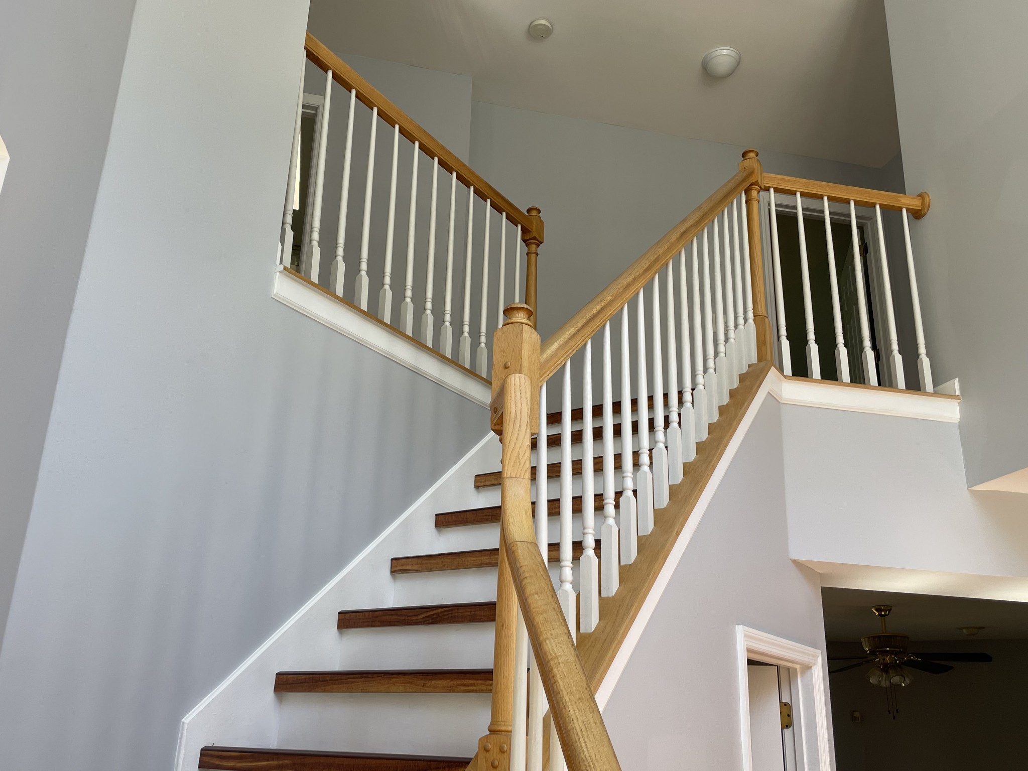 313 Compass Point Hermitage, TN 37076 - Photo 6 of 11 a view of staircase with wooden floor and white walls