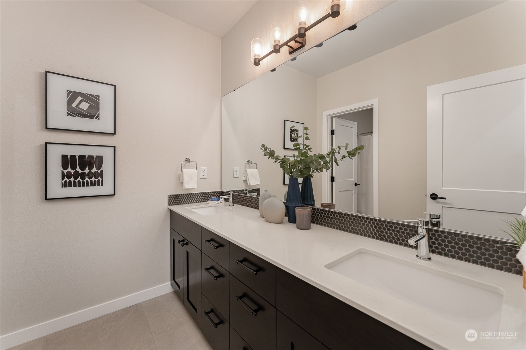 1074 Southwest Collier Place Issaquah, WA 98027 - Photo 15 of 36 a bathroom with a sink and a mirror