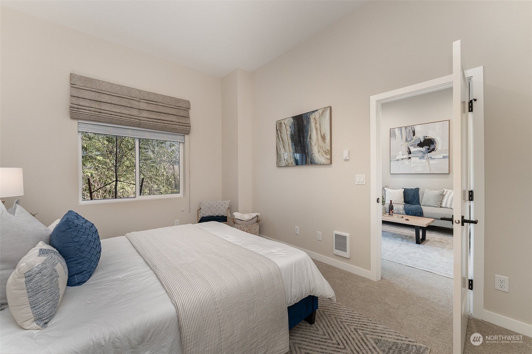 1074 Southwest Collier Place Issaquah, WA 98027 - Photo 23 of 36 a bedroom with a large bed and a window