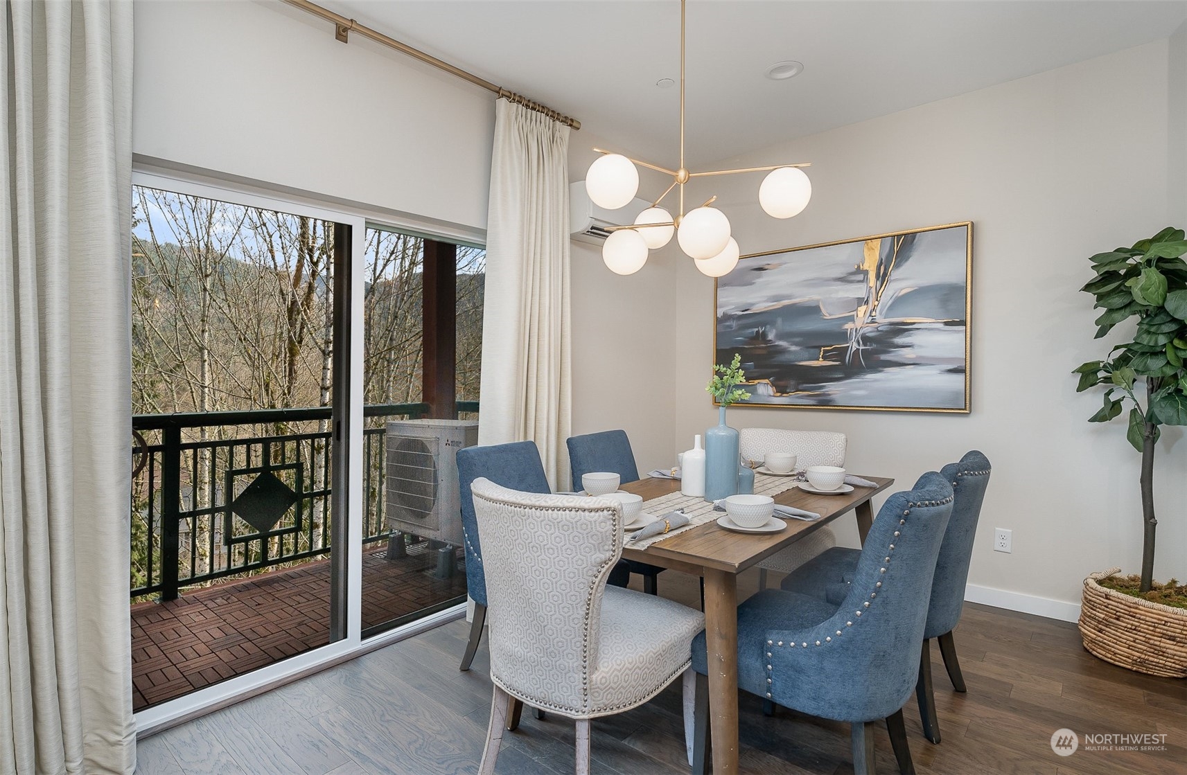 1074 Southwest Collier Place Issaquah, WA 98027 - Photo 5 of 36 a view of a dining room with furniture window and wooden floor