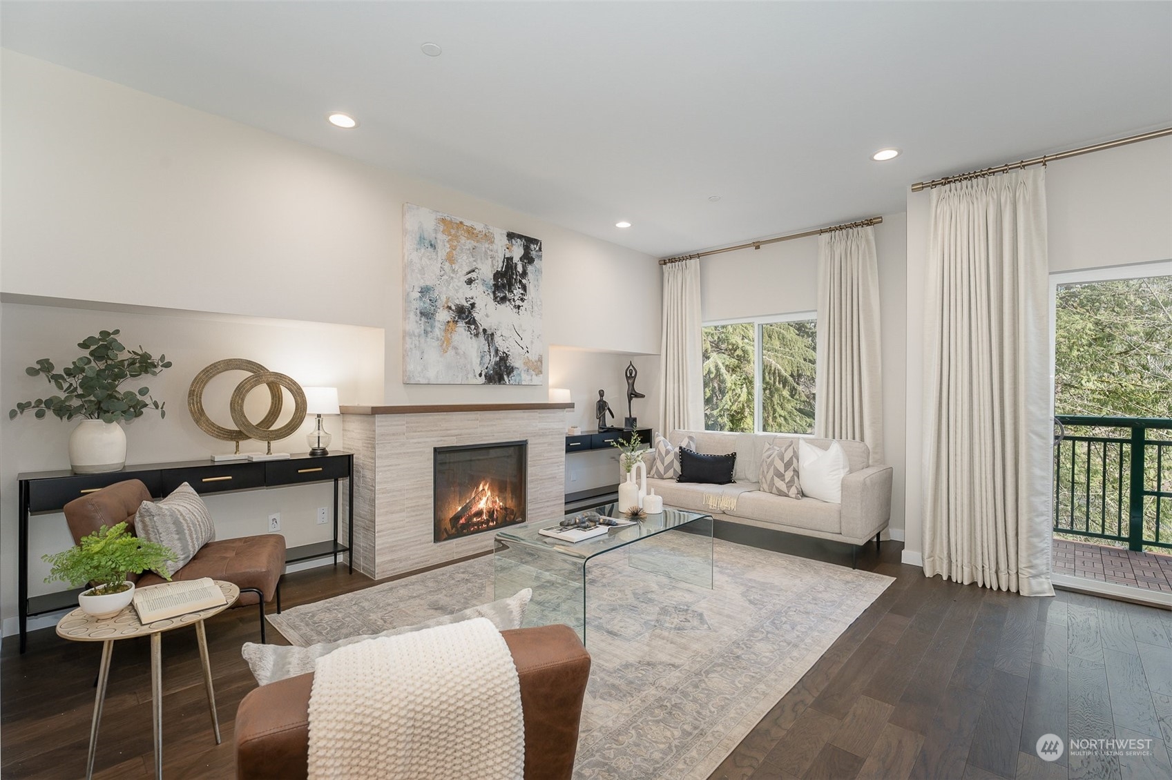 1074 Southwest Collier Place Issaquah, WA 98027 - Photo 6 of 36 a living room with furniture and a fireplace
