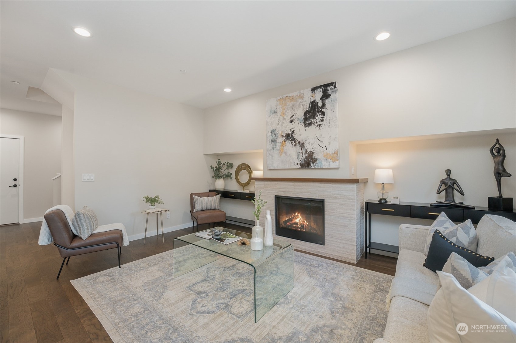 1074 Southwest Collier Place Issaquah, WA 98027 - Photo 8 of 36 a living room with furniture and a fireplace