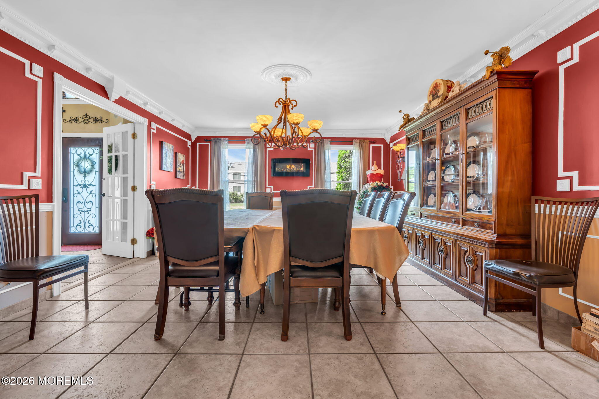 21 Ryan Road Marlboro, NJ 07746 - Photo 18 of 56 a view of a dining room with furniture and chandelier