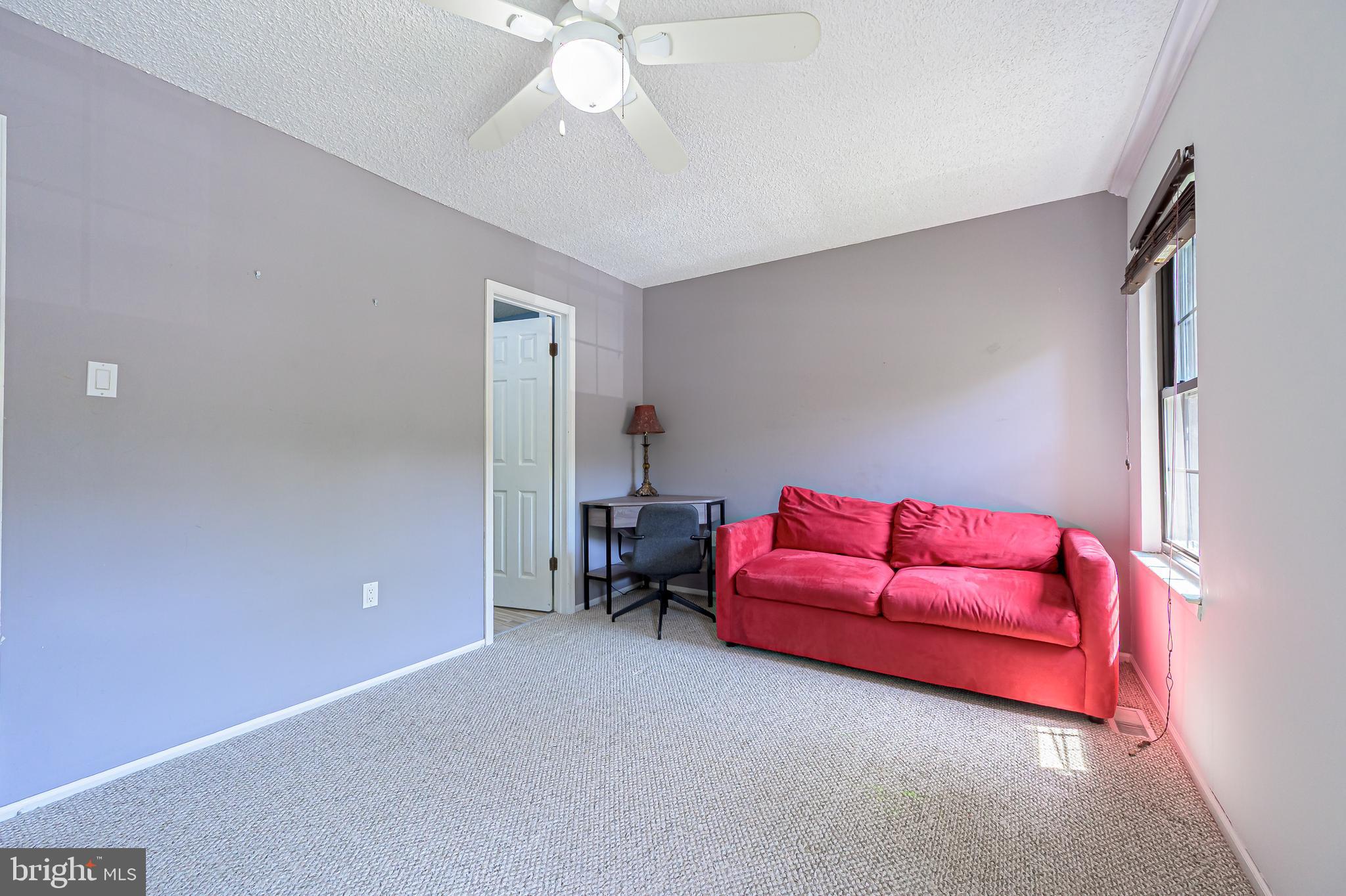 298 Mattix Run Galloway Township, NJ 08205 - Photo 21 of 36 a living room with furniture and a chandelier