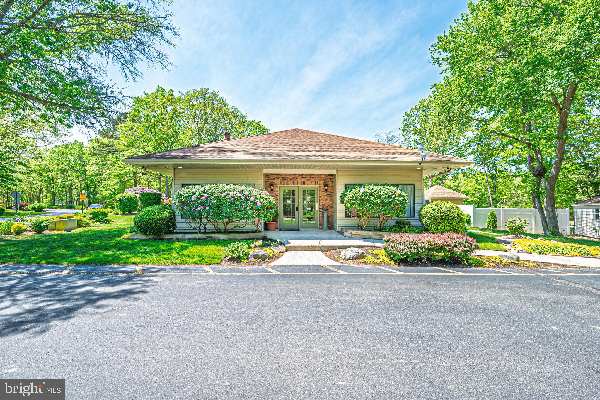 298 Mattix Run Galloway Township, NJ 08205 - Photo 31 of 36 a view of swimming pool with a garden and plants