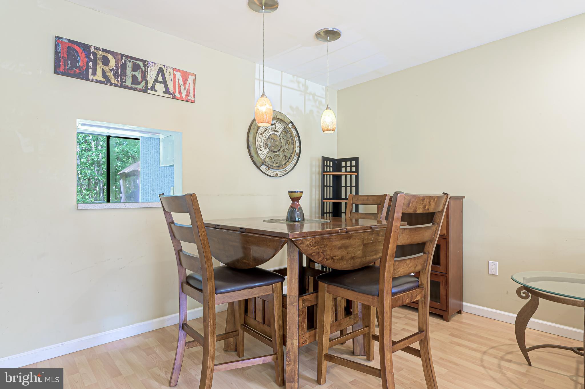 298 Mattix Run Galloway Township, NJ 08205 - Photo 8 of 36 a view of a dining room with furniture and a table