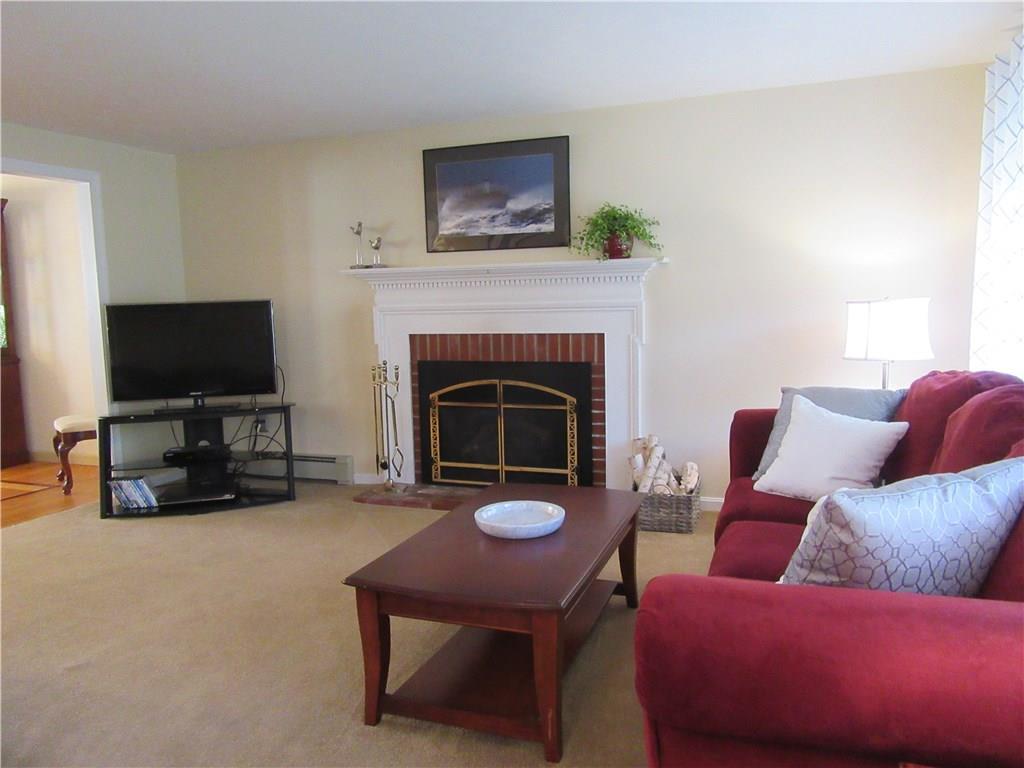 2 Thunder Road Saco, ME 04072 - Photo 19 of 42 Living room with a fireplace.