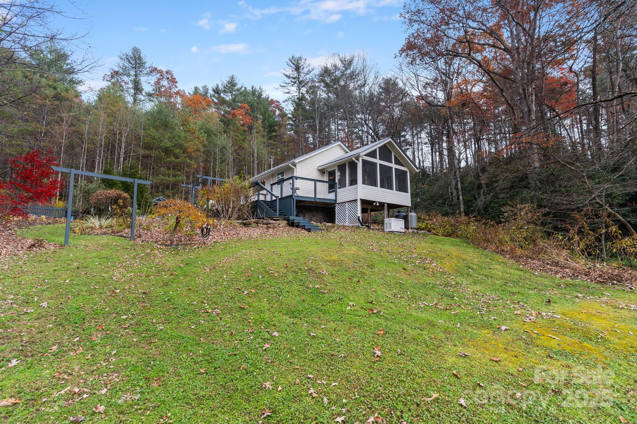 200 Nimitz Drive Brevard, NC 28712 - Photo 30 of 44 a view of a house with backyard and trees