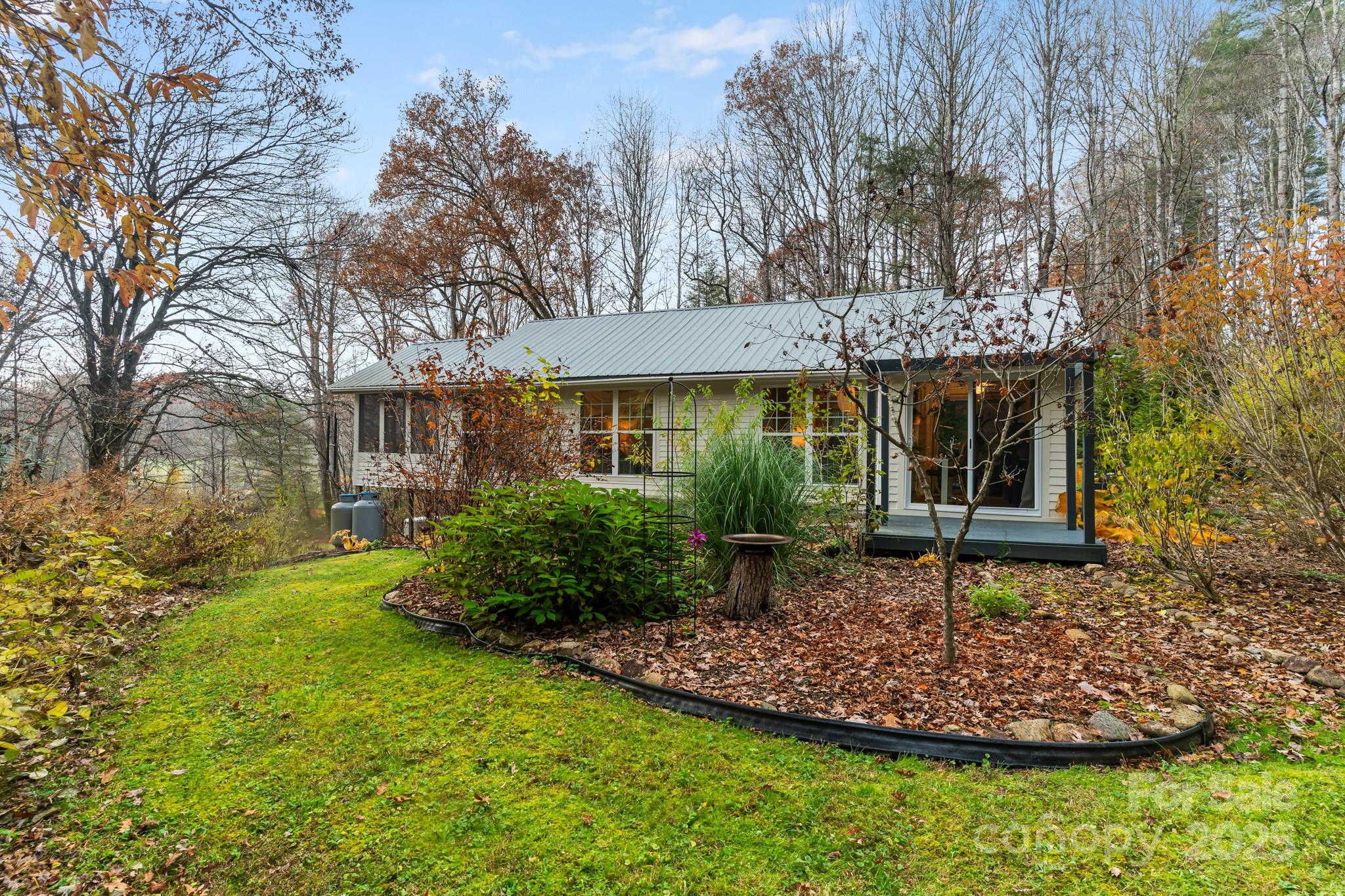 200 Nimitz Drive Brevard, NC 28712 - Photo 35 of 44 a front view of a house with garden