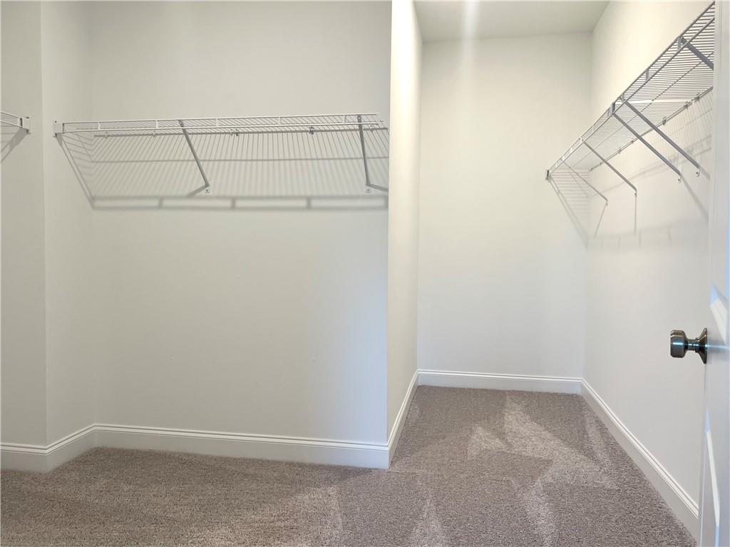 3347 Goodwin Park Suwanee, GA 30024 - Photo 16 of 28 a view of a room with racks on the wall