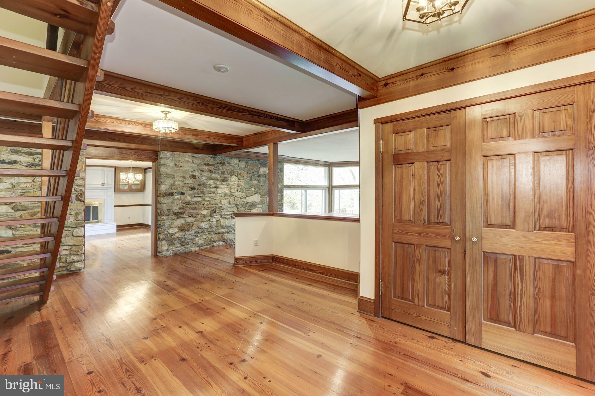 10187 Cliff Mills Road Marshall, VA 20115 - Photo 11 of 46 Front entrance w wood floors and exposed beams