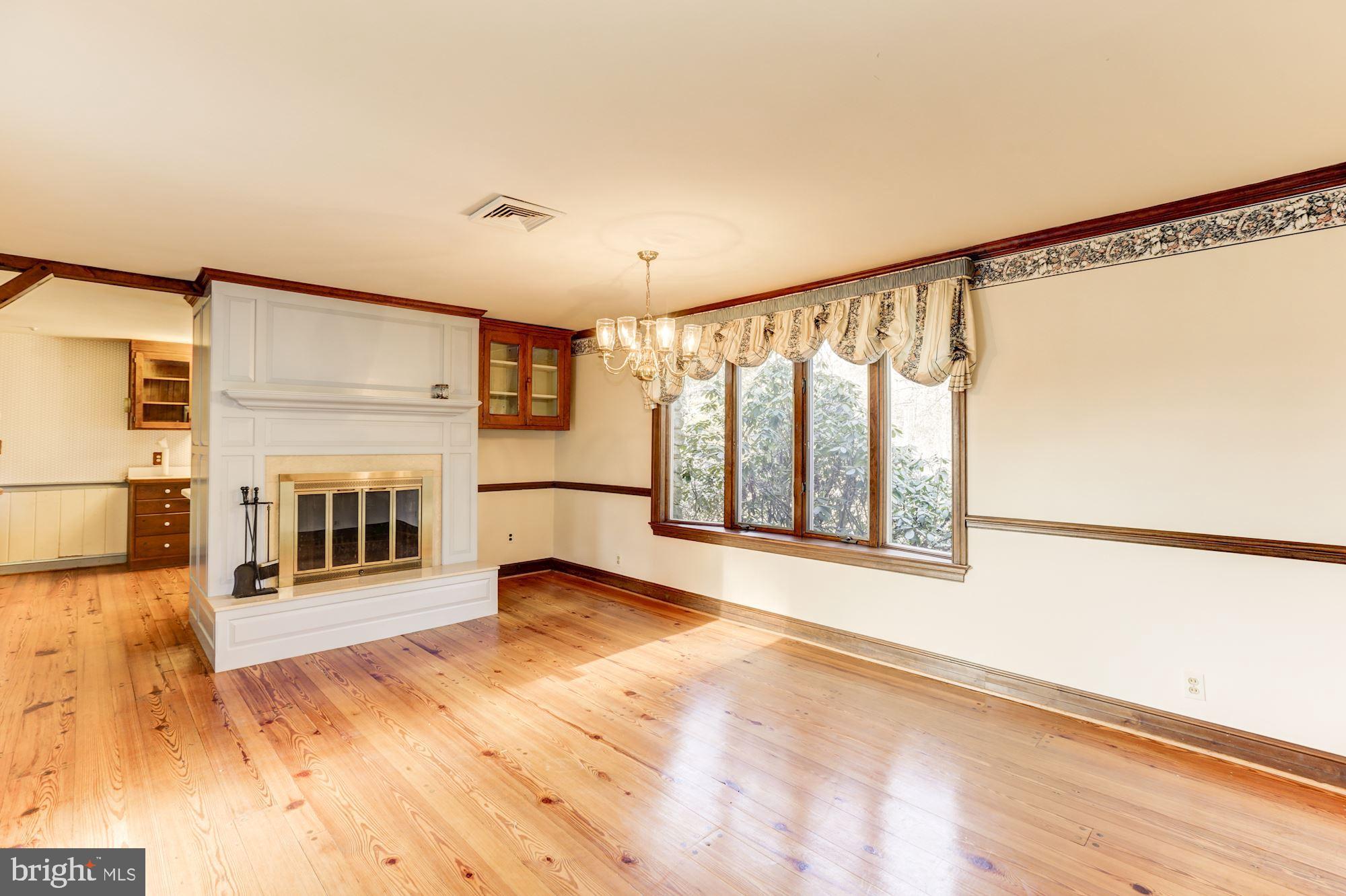 10187 Cliff Mills Road Marshall, VA 20115 - Photo 15 of 46 Formal dining room w another fireplace
