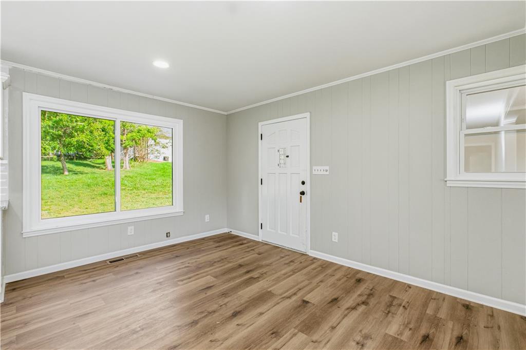 5605 Burke Lane Gainesville, GA 30506 - Photo 29 of 62 a view of empty room with wooden floor and fan