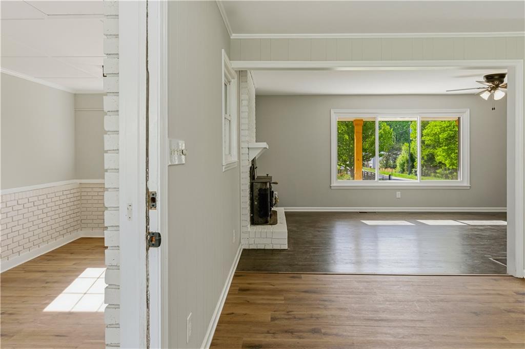 5605 Burke Lane Gainesville, GA 30506 - Photo 33 of 62 a view of a hallway view with wooden floor and staircase