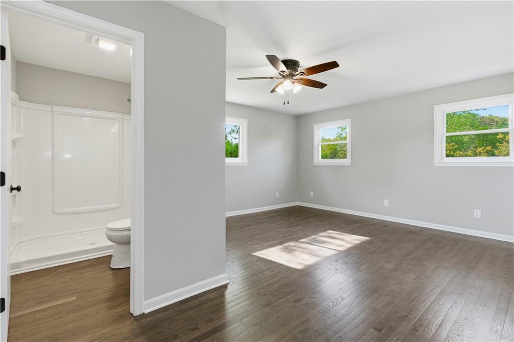 5605 Burke Lane Gainesville, GA 30506 - Photo 37 of 62 a view of empty room with wooden floor and fan