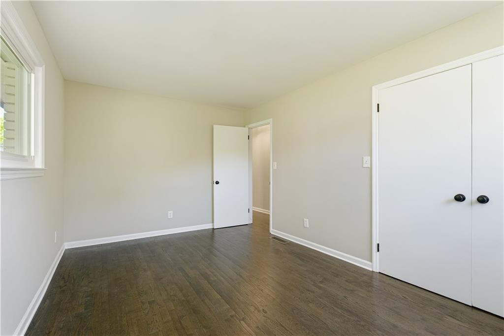 5605 Burke Lane Gainesville, GA 30506 - Photo 43 of 62 an empty room with wooden floor and windows