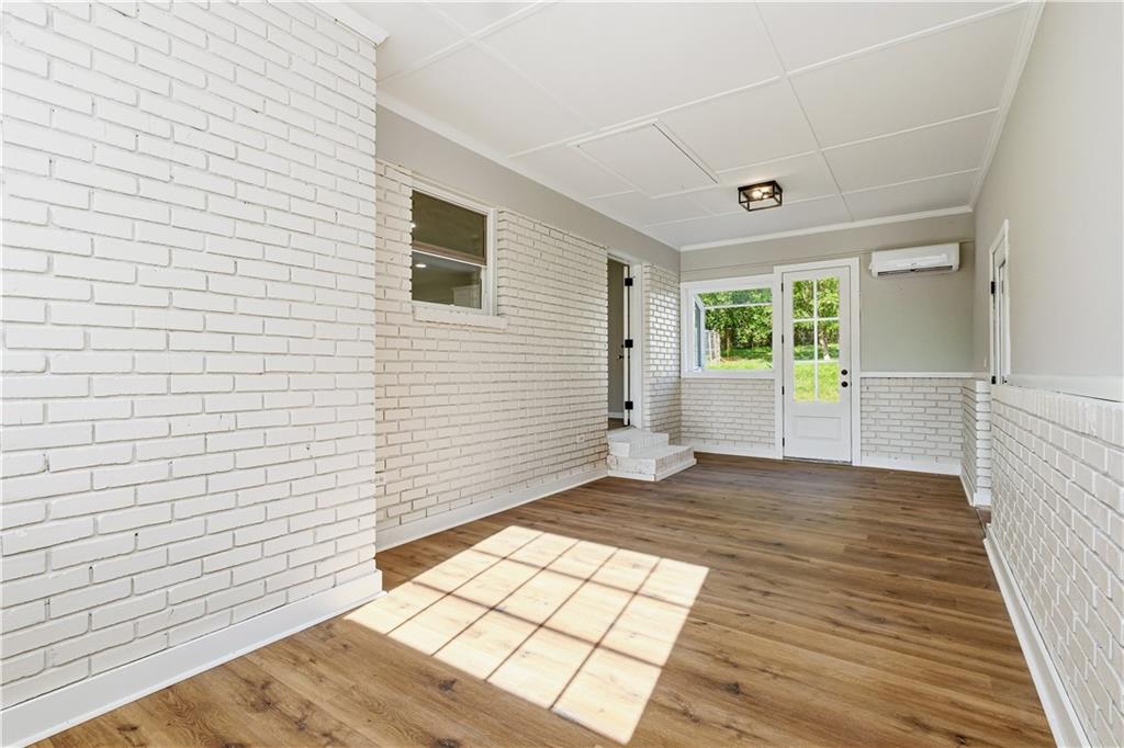 5605 Burke Lane Gainesville, GA 30506 - Photo 47 of 62 a view of an empty room with wooden floor and a window