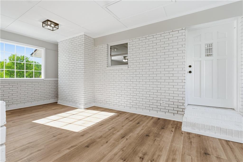 5605 Burke Lane Gainesville, GA 30506 - Photo 50 of 62 an empty room with wooden floor and windows