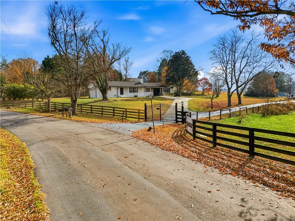 5605 Burke Lane Gainesville, GA 30506 - Photo 9 of 62 a view of street with wooden fence