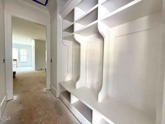 a view of a bathroom from a hallway