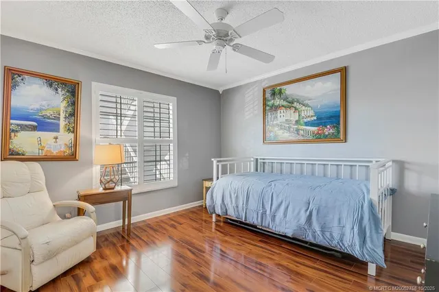 a view of a bathroom with a sink and mirror
