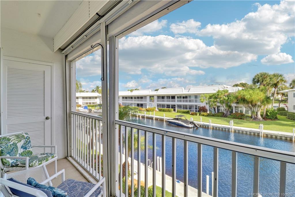 1866 Southwest Palm City Road, Unit 204 Stuart, FL 34994 - Photo 27 of 56 a view of a city from a balcony