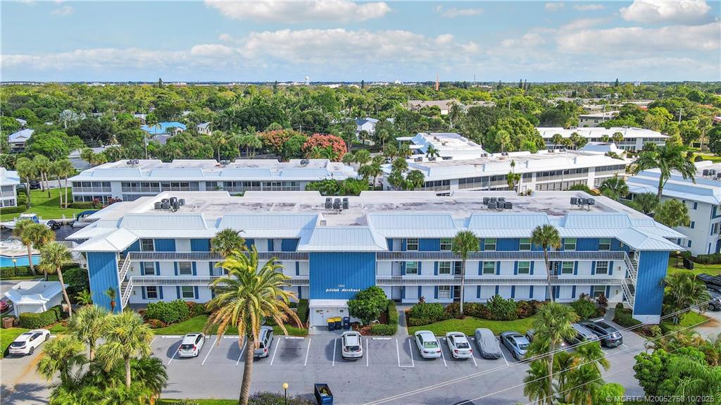 1866 Southwest Palm City Road, Unit 204 Stuart, FL 34994 - Photo 43 of 56 a view of a city that has tall buildings