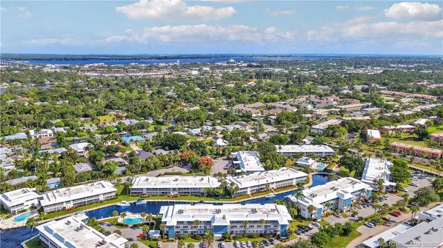 an aerial view of residential building and street