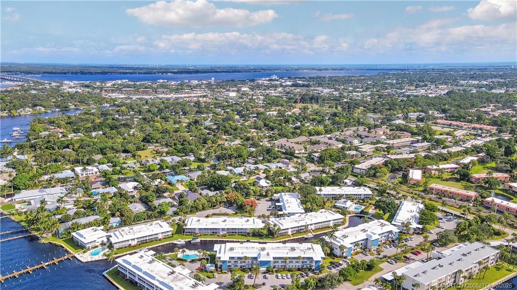 1866 Southwest Palm City Road, Unit 204 Stuart, FL 34994 - Photo 47 of 56 an aerial view of residential building and street