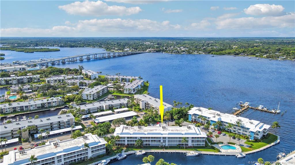 1866 Southwest Palm City Road, Unit 204 Stuart, FL 34994 - Photo 55 of 56 an aerial view of a house with a lake view