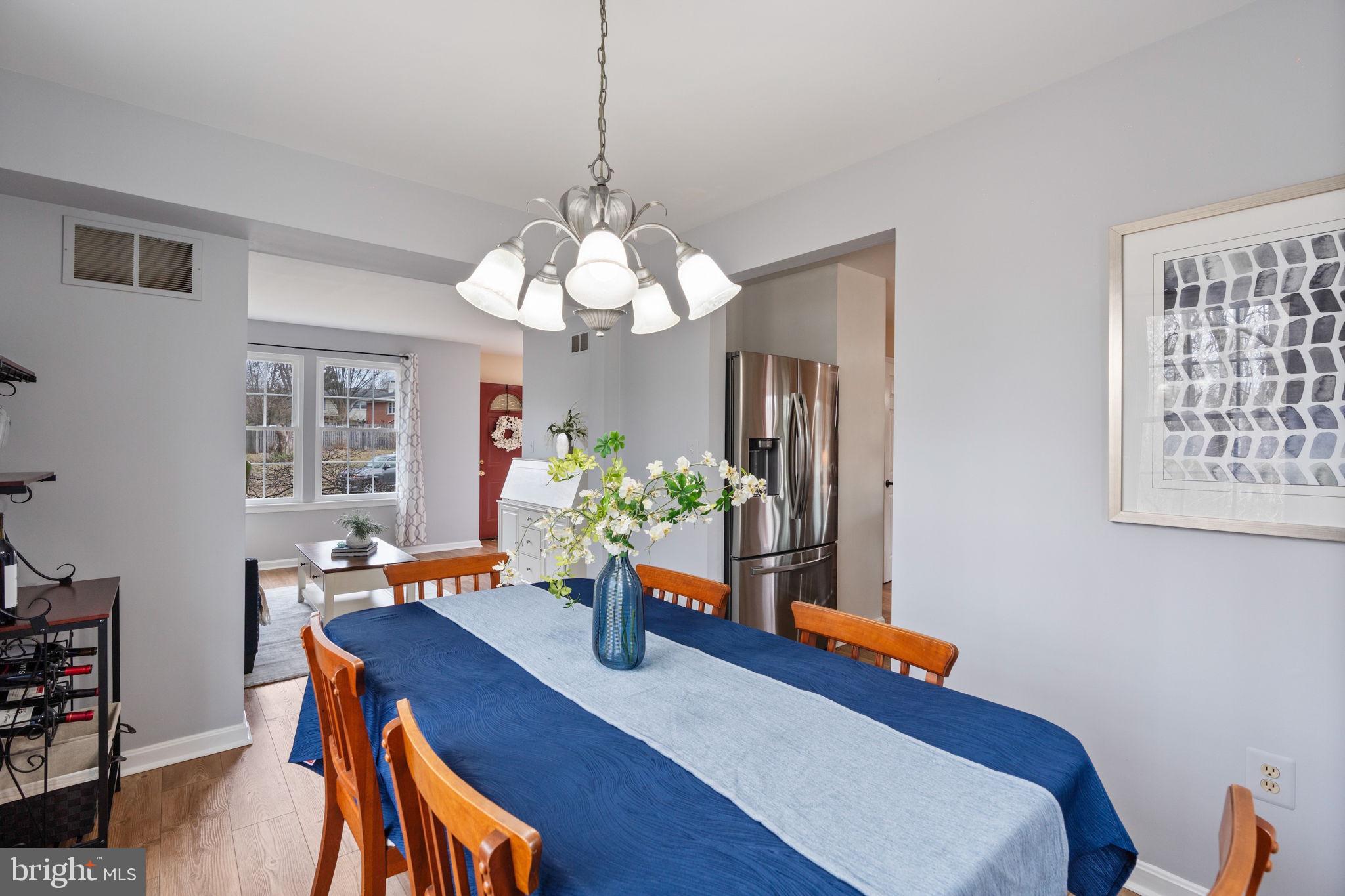 502 Durango Road Catonsville, MD 21228 - Photo 15 of 74 a view of a dining room with furniture and wooden floor