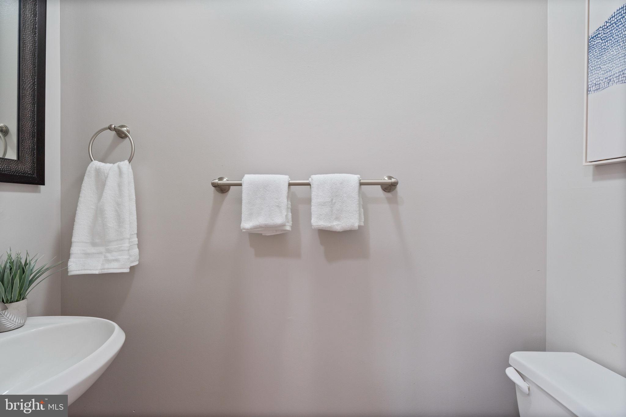 502 Durango Road Catonsville, MD 21228 - Photo 17 of 74 a bathroom with a sink a toilet and a tub