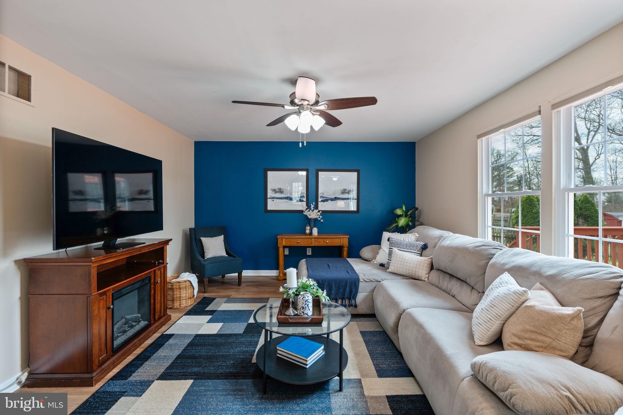 502 Durango Road Catonsville, MD 21228 - Photo 23 of 74 a living room with furniture and a flat screen tv
