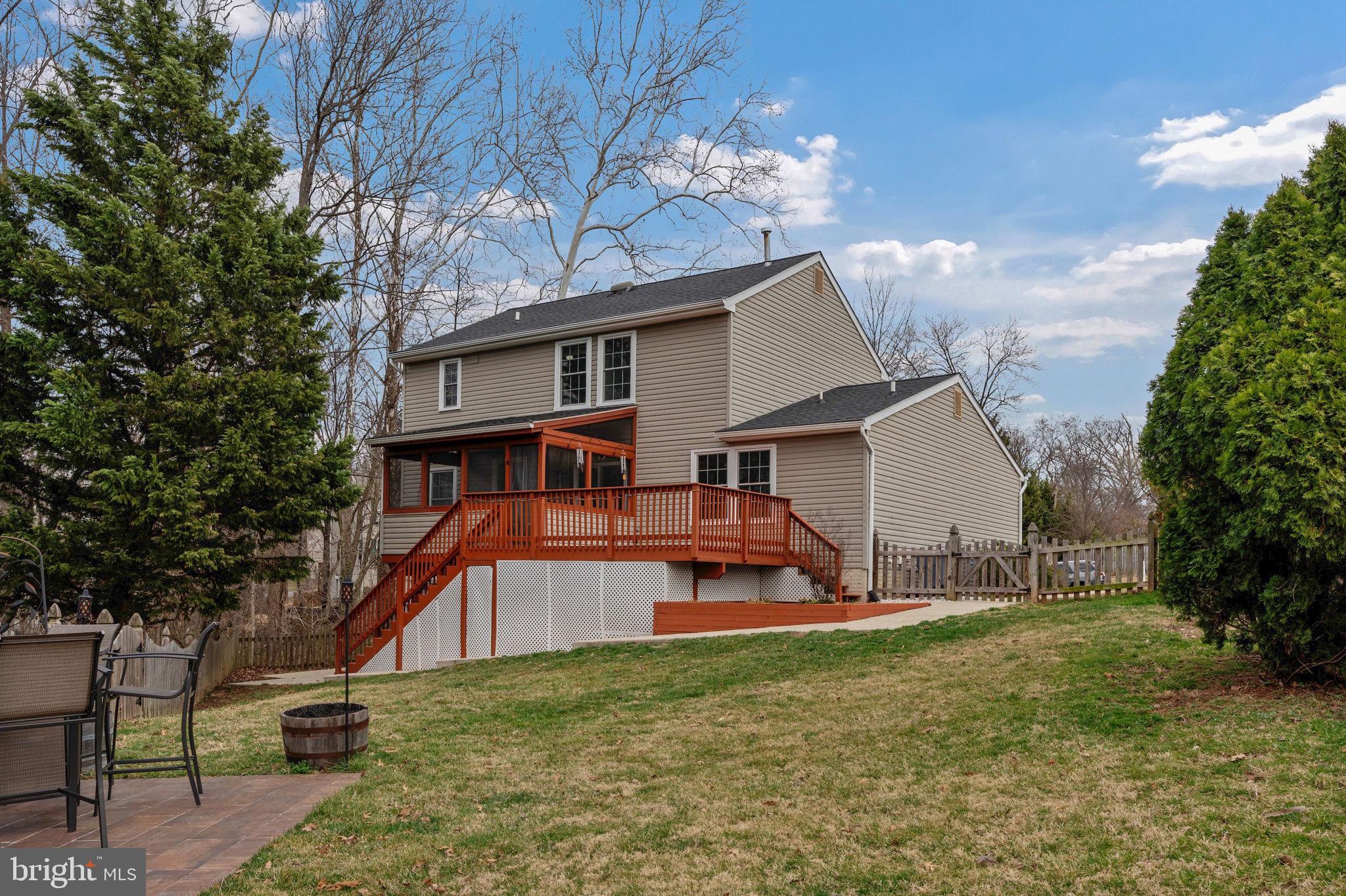 502 Durango Road Catonsville, MD 21228 - Photo 37 of 74 a view of a house with a yard patio and fire pit