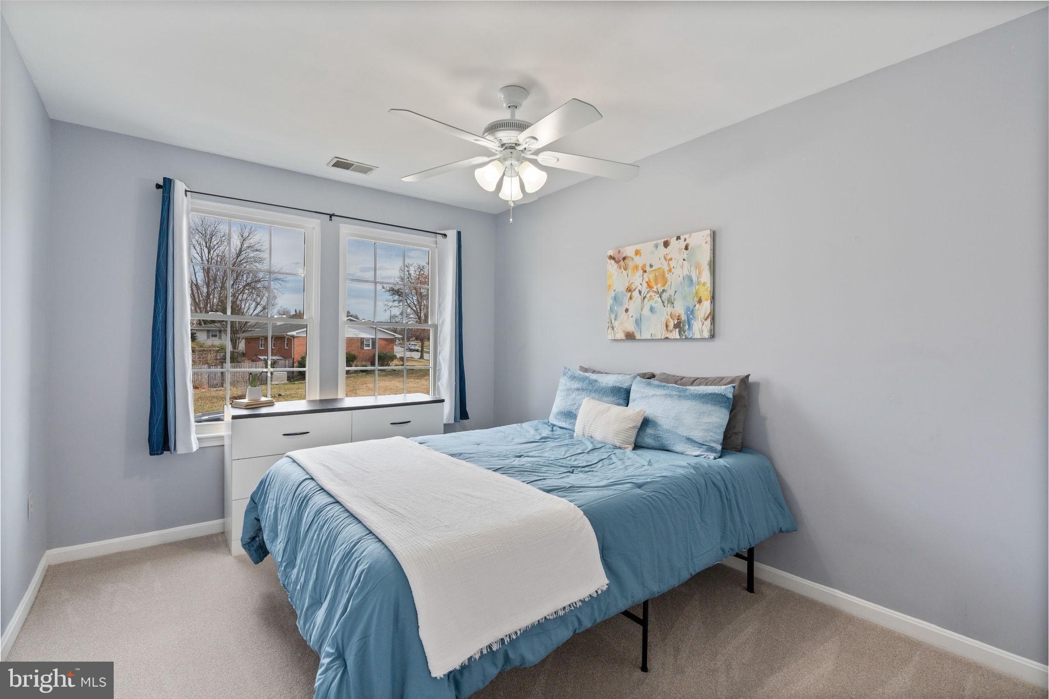 502 Durango Road Catonsville, MD 21228 - Photo 45 of 74 a bedroom with a large bed and a window