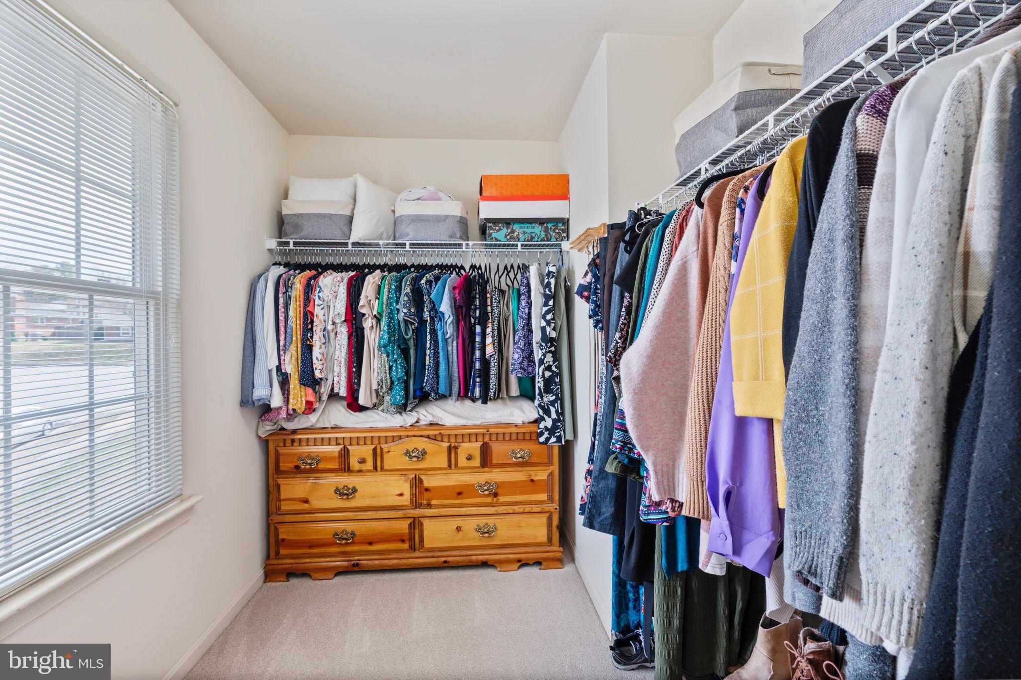 502 Durango Road Catonsville, MD 21228 - Photo 52 of 74 a view of walk in closet with clothes and shoes