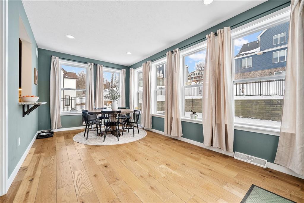 141 Morningstar Drive Rostraver Township, PA 15012 - Photo 16 of 39 The sunroom provides an easy transition between the kitchen and backyard, with generous space that extends the home’s living area.