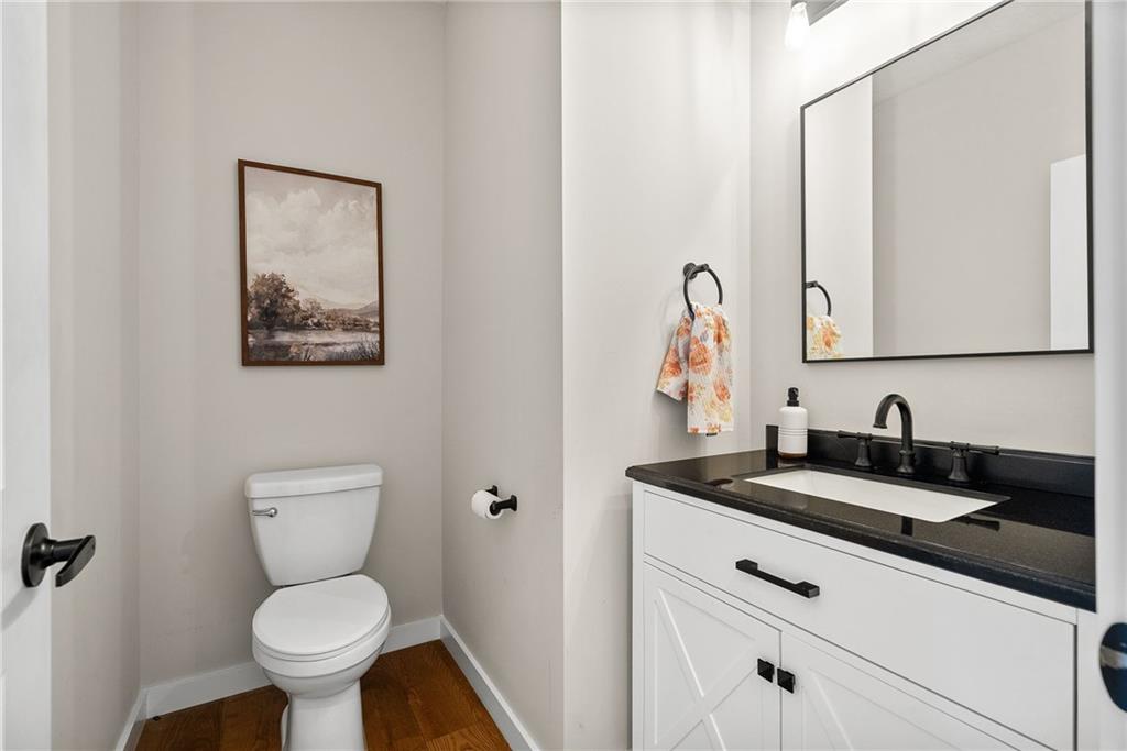 141 Morningstar Drive Rostraver Township, PA 15012 - Photo 17 of 39 A conveniently located powder room designed for guests, offering style and function on the main level.