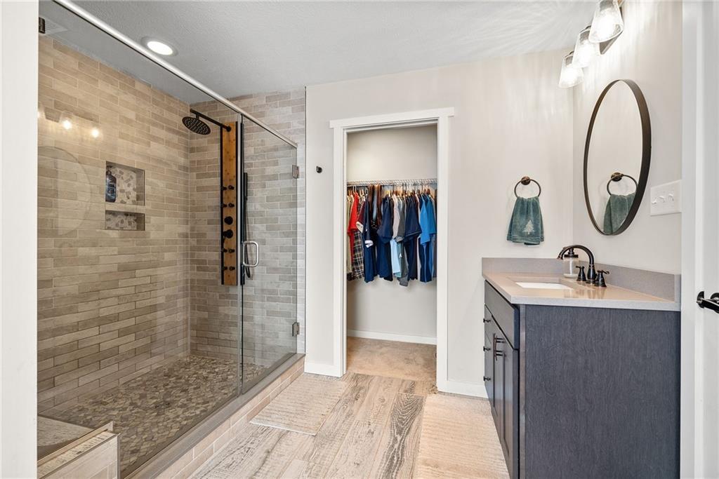 141 Morningstar Drive Rostraver Township, PA 15012 - Photo 24 of 39 A walk-in closet provides generous storage and an organized extension of the primary suite.